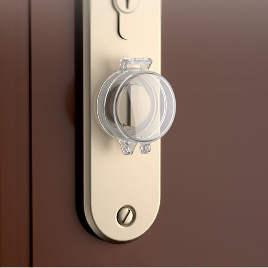 Close-up of a transparent protective cover on an electronic door lock for child-proof safety.